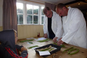 Adjudicator Harry watches closely as the judges earnestly go about their business